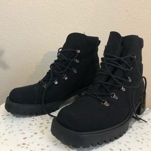 stuart weitzman black combat boots